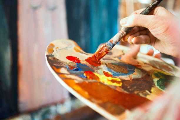 Artist Painting in studio
